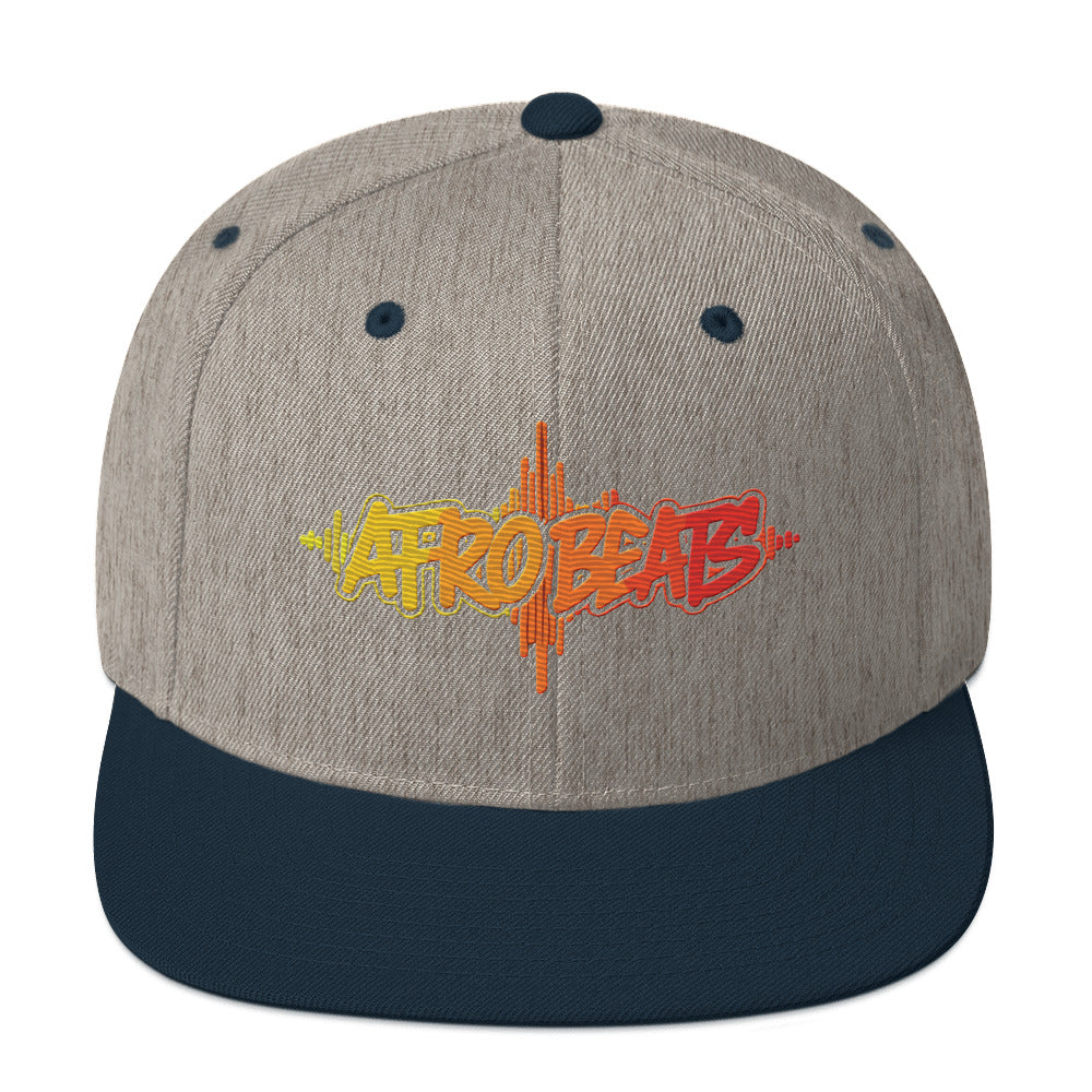 AfroDrip AfroBeats Snapback Hat in black, front view showing embroidered logo or graphic on the crown panel