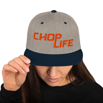 AfroDrip 'Chop Life' Snapback Hat in black, front view showing embroidered 'Chop Life' text or logo on the crown
