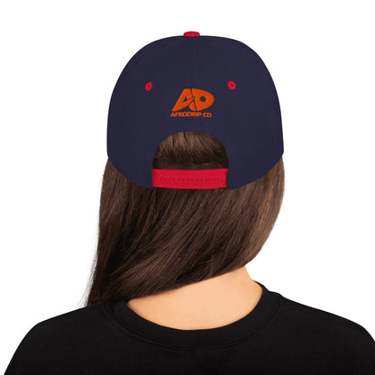 AfroDrip 'Chop Life' Snapback Hat in black, front view showing embroidered 'Chop Life' text or logo on the crown